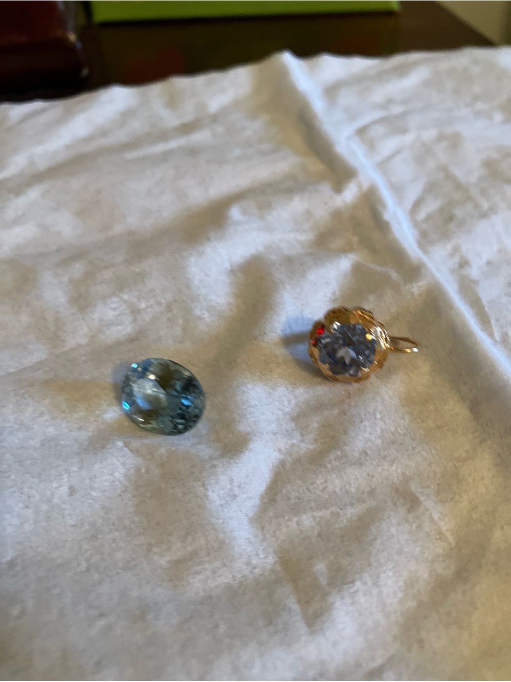 2 beautiful blue stones make into anything pendant necklace or a pin or a ring.